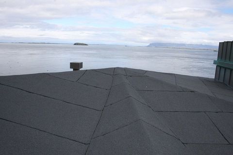 Flatt þak með útsýni til sjávar